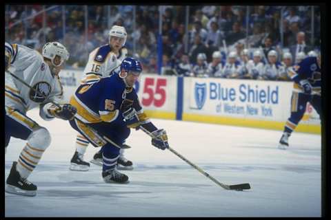 3 Jan 1992: Center Craig Janney of the St. Louis Blues moves the puck during a game against the Buffalo Sabres at Memorial Auditorium in Buffalo, New York. Mandatory Credit: Rick Stewart /Allsport