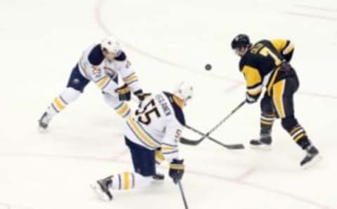 Buffalo Sabres defensemen Jake McCabe (29) and Rasmus Ristolainen (55) defend Pittsburgh Penguins center Matt Cullen (7) (Charles LeClaire-USA TODAY Sports)