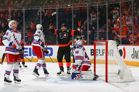 PHILADELPHIA, PA – FEBRUARY 28: Claude Giroux #28 of the Philadelphia Flyers reacts in front Ryan Lindgren #55, Marc Staal #18, and Alexandar Georgiev #40 of the New York Rangers after scoring a goal in the third period at the Wells Fargo Center on February 28, 2020 in Philadelphia, Pennsylvania. The Flyers defeated the Rangers 5-2. (Photo by Mitchell Leff/Getty Images)