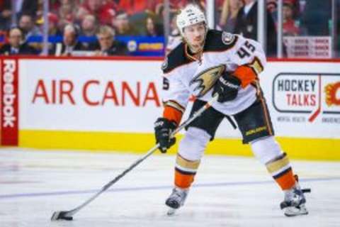 Dec 29, 2015; Calgary, Alberta, CAN; Anaheim Ducks defenseman Sami Vatanen (45) controls the puck against the Calgary Flames during the third period at Scotiabank Saddledome. Anaheim Ducks won 1-0. Mandatory Credit: Sergei Belski-USA TODAY Sports