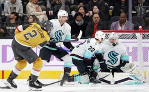 LAS VEGAS, NEVADA – NOVEMBER 25: Philipp Grubauer #31 of the Seattle Kraken makes a save against Zach Whitecloud #2 of the Vegas Golden Knights in the third period of their game at T-Mobile Arena on November 25, 2022, in Las Vegas, Nevada. The Kraken defeated the Golden Knights 4-2. (Photo by Ethan Miller/Getty Images)