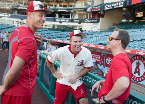 ANAHEIM, CA – AUGUST 16: The Ducks’ Ryan Getzlaf, left, shares a laugh with Mike Trout and trainer Adam Nevala before Ducks Night at Angel Stadium on Tuesday.///ADDITIONAL INFO:anotes.0817.kjs — Photo by KEVIN SULLIVAN / Orange County Register — 8/16/16The Anaheim Ducks’ Ryan Getzlaf, Andrew Cogliano and Clayton Stoner visited Anaheim Stadium for Ducks Day before the Los Angeles Angels take on the Seattle Mariners at Angel Stadium.(Photo by Kevin Sullivan/Digital First Media/Orange County Register via Getty Images)