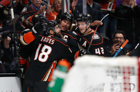 ANAHEIM, CA – NOVEMBER 07: Josh Manson #42 and Patrick Eaves #18 celebrate a goal by Ryan Getzlaf #15 of the Anaheim Ducks during the third period of a game against the Calgary Flames at Honda Center on November 7, 2018, in Anaheim, California. (Photo by Sean M. Haffey/Getty Images)