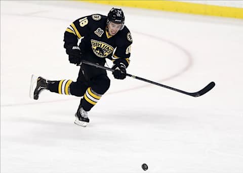 Dec 27, 2013; Boston, MA, USA; Boston Bruins right wing Reilly Smith (18) skates up ice after passing the puck during the first period of their 5-0 win over the Ottawa Senators at TD Garden. Mandatory Credit: Winslow Townson-USA TODAY Sports