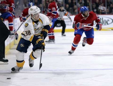 Feb 22, 2016; Montreal, Quebec, CAN; Nashville Predators forward Viktor Arvidsson (38) chases the puck during the second period against the Montreal Canadiens at the Bell Centre. Mandatory Credit: Eric Bolte-USA TODAY Sports