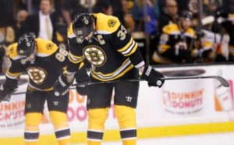 Boston Bruins left wing David Pastrnak (88) and defenseman Zdeno Chara (33) react after being defeated by the Ottawa Senators in the 2017 Stanley Cup Playoffs (Greg M. Cooper-USA TODAY Sports)