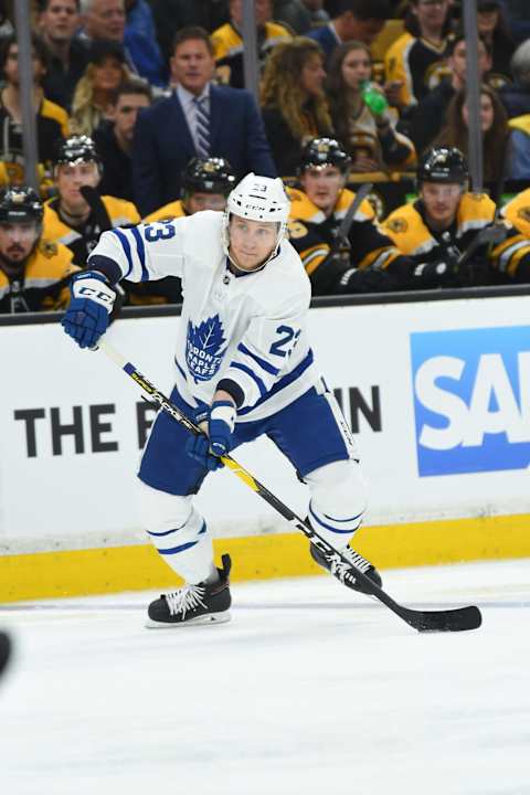 BOSTON, MA - APRIL 19: Travis Dermott #23 of the Toronto Maple Leafs passes the puck against the Boston Bruins in Game Five of the Eastern Conference First Round during the 2019 NHL Stanley Cup Playoffs at the TD Garden on April 19, 2019 in Boston, Massachusetts. (Photo by Steve Babineau/NHLI via Getty Images)