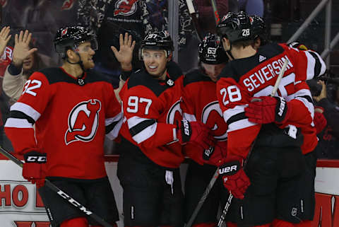 The New Jersey Devils celebrate a goal: (Ed Mulholland-USA TODAY Sports)