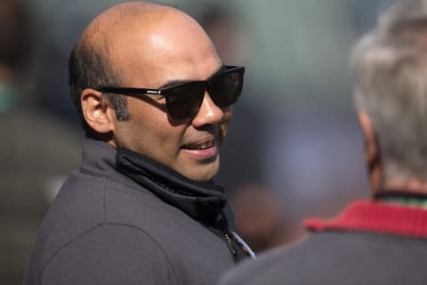 Oct 7, 2021; San Francisco, CA, USA; San Francisco Giants president of baseball operations Farhan Zaidi talks with a reporter during NLDS workouts. Mandatory Credit: D. Ross Cameron-USA TODAY Sports