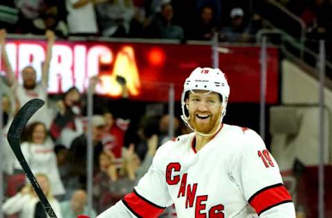 RALEIGH, NC – OCTOBER 12: Dougie Hamilton #19 of the Carolina Hurricanes scores a goal and celebrates during an NHL game against the Columbus Blue Jackets on October 12, 2019 at PNC Arena in Raleigh North Carolina. (Photo by Gregg Forwerck/NHLI via Getty Images)