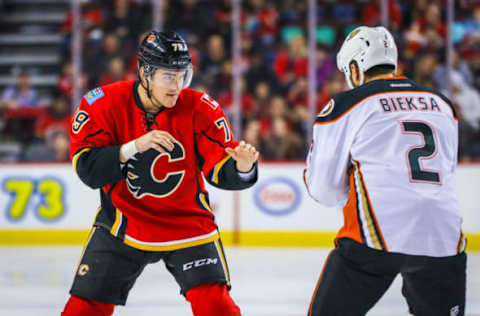 Dec 4, 2016; Calgary, Alberta, CAN; Calgary Flames left wing Micheal Ferland (79) and Anaheim Ducks defenseman Kevin Bieksa (2) fight during the first period at Scotiabank Saddledome. Mandatory Credit: Sergei Belski-USA TODAY Sports