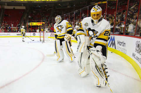 NHL Power Rankings: Pittsburgh Penguins goalie Marc-andre Fleury (29) and goalie Matt Murray (30) skate before the game against the Carolina Hurricanes at PNC Arena. The Pittsburgh Penguins defeated the Carolina Hurricanes 7-1. Mandatory Credit: James Guillory-USA TODAY Sports