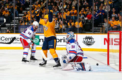 NASHVILLE, TENNESSEE – DECEMBER 29: Nick Bonino #13 of the Nashville Predators celebrates after scoring a goal against goalie Henrik Lundqvist #30 of the New York Rangers during the first period at Bridgestone Arena on December 29, 2018 in Nashville, Tennessee. (Photo by Frederick Breedon/Getty Images)