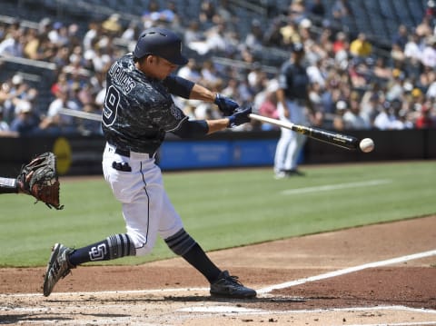 SAN DIEGO, CA – SEPTEMBER 2: Luis Urias #9 of the San Diego Padres hits a single during the first inning of a baseball game against the Colorado Rockies at PETCO Park on September 2, 2018 in San Diego, California. (Photo by Denis Poroy/Getty Images)