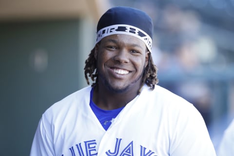 SURPRISE, AZ – OCTOBER 17: Vladimir Guerrero Jr. #27 of the Surprise Saguaros and Toronto Blue Jays looks on during the 2018 Arizona Fall League on October 17, 2018 at Surprise Stadium in Surprise, Arizona. (Photo by Joe Robbins/Getty Images)