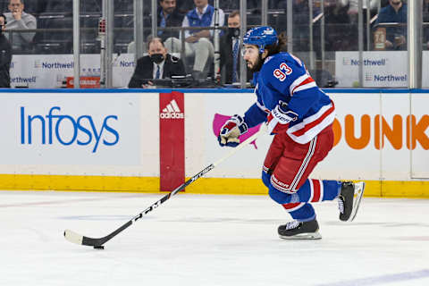 Feb 24, 2022; New York, New York, USA; New York Rangers center Mika Zibanejad (93) skate up ice during the second period against the Washington Capitals at Madison Square Garden. Mandatory Credit: Vincent Carchietta-USA TODAY Sports