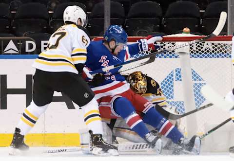 Jakub Zboril #67 and Tuukka Rask #40 of the Boston Bruins defend against Alexis Lafreniere #13 of the New York Rangers Credit: POOL PHOTOS-USA TODAY Sports