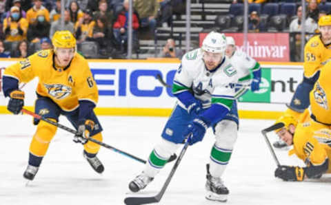 Jan 18, 2022; Nashville, Tennessee, USA; Vancouver Canucks left wing Tanner Pearson (70) skates against the Nashville Predators during the second period at Bridgestone Arena. Mandatory Credit: Steve Roberts-USA TODAY Sports