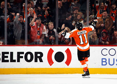 Travis Konecny embraces the crowd after scoring for the Flyers. (Photo by Bruce Bennett/Getty Images)