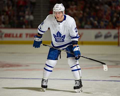 DETROIT, MI – OCTOBER 11: Travis Dermott #23 of the Toronto Maple Leafs gets set for the face-off against the Detroit Red Wings during an NHL game at Little Caesars Arena on October 11, 2018 in Detroit, Michigan. The Leafs defeated the Wings 5-3. (Photo by Dave Reginek/NHLI via Getty Images)