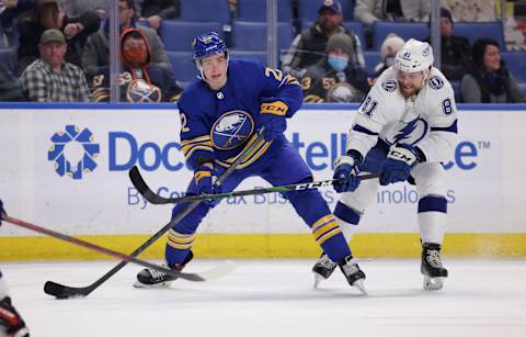 Jan 11, 2022; Buffalo, New York, USA; Buffalo Sabres right wing Jack Quinn (22) looks to make a pass as Tampa Bay Lightning defenseman Erik Cernak (81) defends during the third period at KeyBank Center. Mandatory Credit: Timothy T. Ludwig-USA TODAY Sports