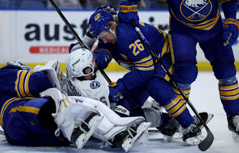 Nov 28, 2022; Buffalo, New York, USA; Tampa Bay Lightning right wing Nikita Kucherov (86) and Buffalo Sabres defenseman Rasmus Dahlin (26) both take penalties during the third period at KeyBank Center. Mandatory Credit: Timothy T. Ludwig-USA TODAY Sports