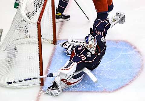 TORONTO, ONTARIO – AUGUST 17: Joonas Korpisalo #70 of the Columbus Blue Jackets allows a goal to Barclay Goodrow of the Tampa Bay Lightning during the second period in Game Four of the Eastern Conference First Round during the 2020 NHL Stanley Cup Playoffs at Scotiabank Arena on August 17, 2020, in Toronto, Ontario. (Photo by Elsa/Getty Images)