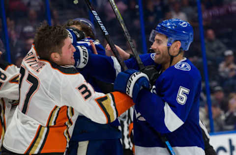 TAMPA, FL – NOVEMBER 27: Dan Girardi #5 of the Tampa Bay Lightning exchanges words and shoves after the whistle with Nick Ritchie #37 of the Anaheim Ducks during the third period at Amalie Arena on November 27, 2018 in Tampa, Florida. (Photo by Scott Audette/NHLI via Getty Images)