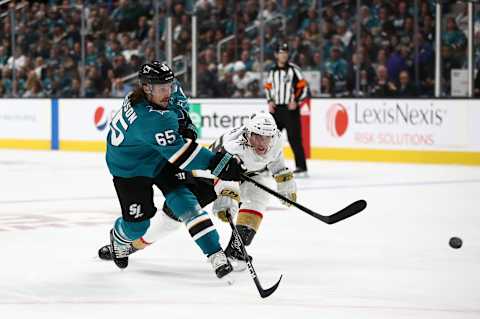 SAN JOSE, CALIFORNIA – OCTOBER 04: Erik Karlsson #65 of the San Jose Sharks is defended by Tomas Nosek #92 of the Vegas Golden Knights at SAP Center on October 04, 2019 in San Jose, California. (Photo by Ezra Shaw/Getty Images)