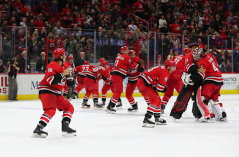 RALEIGH, NC – FEBRUARY 02: Carolina Hurricanes celebrate a win by playing football on Super Bowl Sunday at the end of the 3rd period of the Carolina Hurricanes game versus the Vancouver Canucks on February 2nd, 2020 at PNC Arena in Raleigh, NC. (Photo by Jaylynn Nash/Icon Sportswire via Getty Images)