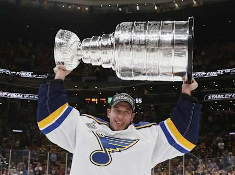 Jordan Binnington of the St. Louis Blues lifts the Stanley Cup (Photo by Bruce Bennett/Getty Images)