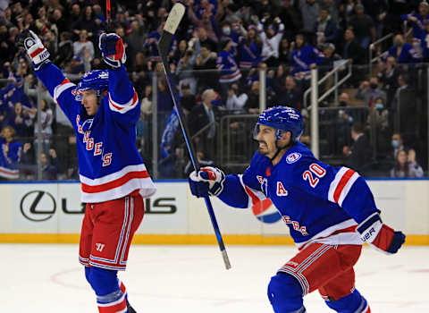 Jan 22, 2022; New York, New York, USA; New York Rangers center Ryan Strome (16) and left wing Chris Kreider (20) reacts after a goal by left wing Artemi Panarin (not pictured) against the Arizona Coyotes during the second period at Madison Square Garden. Mandatory Credit: Danny Wild-USA TODAY Sports