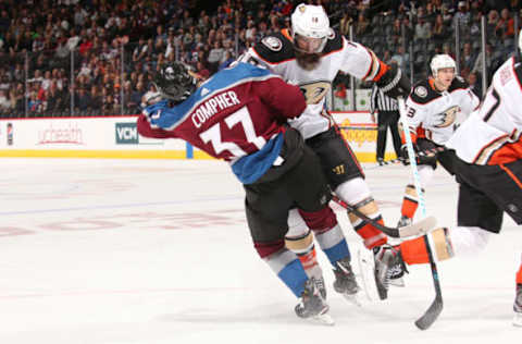 DENVER, CO: Patrick Eaves #18 of the Anaheim Ducks fights for position against J.T. Compher #37 of the Colorado Avalanche at the Pepsi Center on October 13, 2017. (Photo by Michael Martin/NHLI via Getty Images)