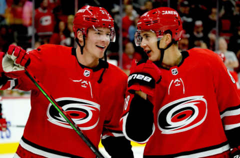 RALEIGH, NC – OCTOBER 3: Andrei Svechnikov #37 of the Carolina Hurricanes and teammate Martin Necas #88 chat during warmups prior to an NHL game against the Montreal Canadiens on October 3, 2019 at PNC Arena in Raleigh North Carolina. (Photo by Gregg Forwerck/NHLI via Getty Images)