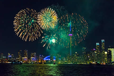 Fireworks in the Toronto skyline during night time (Photo by Roberto Machado Noa/LightRocket via Getty Images)