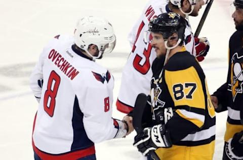 May 10, 2016; Pittsburgh, PA, USA; Washington Capitals left wing Alex Ovechkin (8) and Pittsburgh Penguins center Sidney Crosby (87) shake hands after game six of the second round of the 2016 Stanley Cup Playoffs at the CONSOL Energy Center. The Pens won 4-3 in overtime to win the series 4 games to 2. Mandatory Credit: Charles LeClaire-USA TODAY Sports