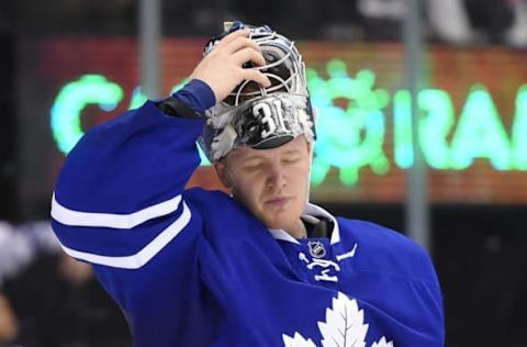 Oct 25, 2016; Toronto, Ontario, CAN; Toronto Maple Leafs goalie Frederik Andersen (31) adjusts his mask during a time out against the Tampa Bay Lightning at Air Canada Centre. Mandatory Credit: Dan Hamilton-USA TODAY Sports