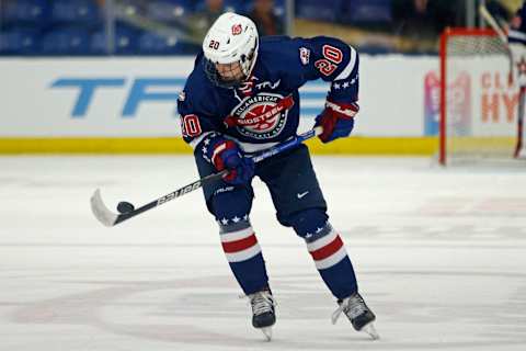 PLYMOUTH, MICHIGAN – JANUARY 16: Will Smith #20 of the United States stops the puck during the third period of the 2023 BioSteel All-American hockey game at USA Hockey Arena on January 16, 2023 in Plymouth, Michigan. (Photo by Mike Mulholland/Getty Images)