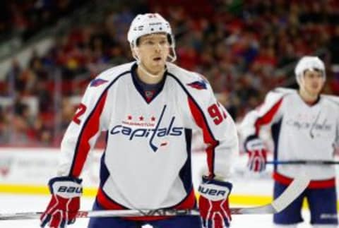 Dec 31, 2015; Raleigh, NC, USA; Washington Capitals forward Evgeny Kuznetsov (92) gets ready for the face off against the Carolina Hurricanes at PNC Arena. The Carolina Hurricanes defeated the Washington Capitals 4-2. Mandatory Credit: James Guillory-USA TODAY Sports