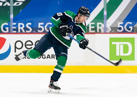 VANCOUVER, BC – FEBRUARY 19: Elias Pettersson #40 of the Vancouver Canucks wearing the team’s reverse retro jerseys shoots the puck warms up prior to NHL hockey action against the Winnipeg Jets at Rogers Arena on February 19, 2021 in Vancouver, Canada. (Photo by Rich Lam/Getty Images)