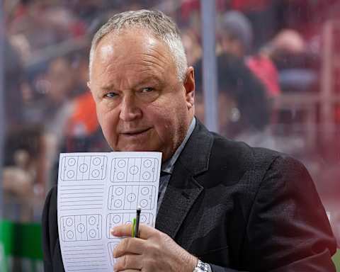 DETROIT, MI – JANUARY 15: Head coach Randy Carlyle of the Anaheim Ducks watches the action from the bench against the Detroit Red Wings during an NHL game at Little Caesars Arena on January 15, 2019, in Detroit, Michigan. Detroit defeated Anaheim 3-1. (Photo by Dave Reginek/NHLI via Getty Images)