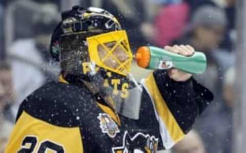 Nov 10, 2016; Pittsburgh, PA, USA; Pittsburgh Penguins goalie Marc-Andre Fleury (29) squirts water onto his face during a time out against the Minnesota Wild in the first period at the PPG Paints Arena. Minnesota won 4-2. Mandatory Credit: Charles LeClaire-USA TODAY Sports