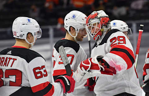 New Jersey Devils left wing Jesper Bratt (63) and goaltender Mackenzie Blackwood (29): (Eric Hartline-USA TODAY Sports)