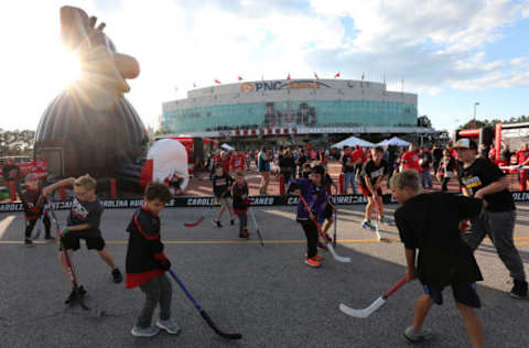 RALEIGH, NORTH CAROLINA – MAY 14: Carolina Hurricanes fans gather outside of the arena prior to Game Three between the Boston Bruins and the Carolina Hurricanes in the Eastern Conference Finals during the 2019 NHL Stanley Cup Playoffs at PNC Arena on May 14, 2019 in Raleigh, North Carolina. (Photo by Bruce Bennett/Getty Images)