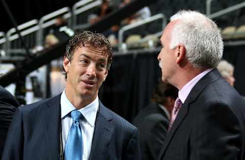 Joe Sakic andJoel Quenneville. (Photo by Bruce Bennett/Getty Images)