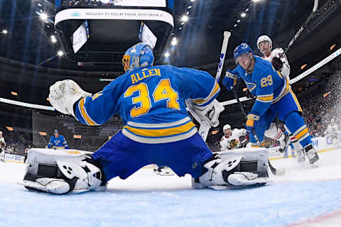 ST. LOUIS, MO – OCTOBER 27: Jake Allen #34 of the St. Louis Blues makes a save as Vince Dunn #29 of the St. Louis Blues defends against Alexandre Fortin #84 of the Chicago Blackhawks at Enterprise Center on October 27, 2018 in St. Louis, Missouri. (Photo by Scott Rovak/NHLI via Getty Images)