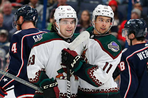 Oct 25, 2022; Columbus, Ohio, USA; Arizona Coyotes right wing Dylan Guenther (11) celebrates a goal during the second period against the Arizona Coyotes at Nationwide Arena. Mandatory Credit: Russell LaBounty-USA TODAY Sports