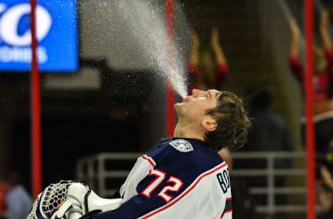 RALEIGH, NC – OCTOBER 10: Columbus Blue Jackets Goalie Sergei Bobrovsky (72) sprays water into the air in a game between the Columbus Blue Jackets and the Carolina Hurricanes at the PNC Arena in Raleigh, NC on October 10, 2017. Columbus defeated Carolina 2 – 1 in overtime. (Photo by Greg Thompson/Icon Sportswire via Getty Images)