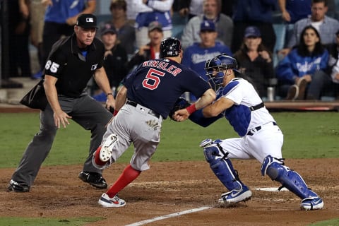 LOS ANGELES, CA – OCTOBER 27: Boston Red Sox second baseman Ian Kinnsler (5) is tagged out trying to score the go ahead run during the tenth inning. The Los Angeles Dodgers host the Boston Red Sox in Game 3 of the World Series at Dodger Stadium in Los Angeles on Oct. 27, 2018. (Photo by Barry Chin/The Boston Globe via Getty Images)