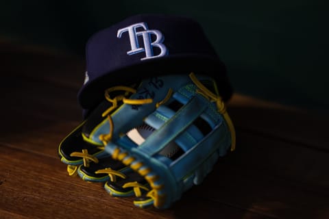 A general view of a Tampa Bay Rays hat and glove. (Photo by Scott Taetsch/Getty Images)